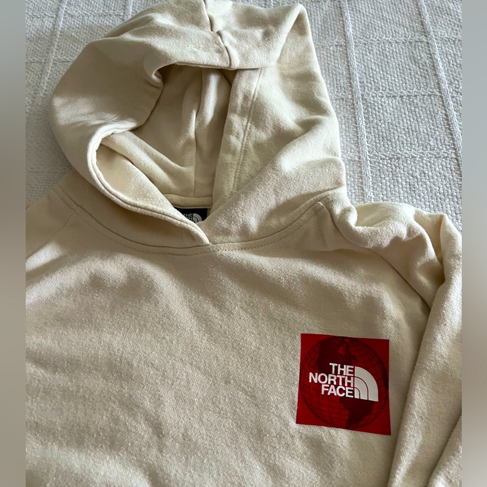 The North Face hoodie size large, cream color